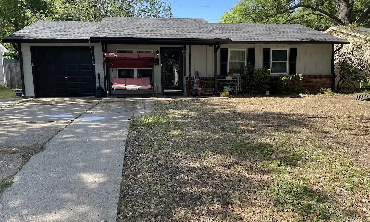 Hail Damage Roof Repair crew at work on a residential roof in Hernando